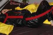 Watching sexy Lucy preparing her bivouac in shiny nylon linen wearing a supersexy black/red oldschool downsuit (Pics)