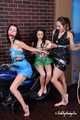 Lucky, Nelly, Xenia - Duo pose on motorbike, one girl hogtied