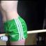 SEXY SONJA tied and gagged with ropes and a bar with a massager between her legs wearing a sexy green shiny nylon shorts and a sexy black rain jacket (Video)