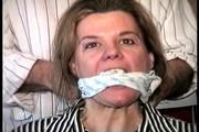 38 Yr OLD SOCIAL WORKER GETS HANDGAGGED, MOUTH STUFFED, CLEAVE GAGGED, OTM GAGGED AND TIED TO A CHAIR (D69-15)