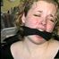 19 YEAR OLD COLLEGE STUDENT SHANA IS TIGHTLY BOUND TO A CHAIR AND HAS HER MOUTH STUFFED & CLEAVE GAGGED ON SCREEN 2 TIMES (D53-10)