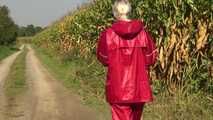 Watch Chloe taking a walk with her shiny nylon Rainwear