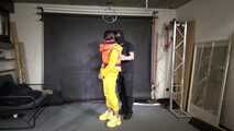 Marie M in a customer wish video handcuffed in Rainwear and a lifevest.