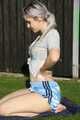 Watch Chloe taking a Sunbath wearing her shiny nylon Shorts under her jeans Shorts 