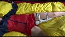 SEXY SONJA being tied and gagged on a bed stimulated with an massager wearing a hot red shiny nylon shorts and an oldschool red/blue rain jacket (Video)