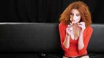 Naughty Yuliya is smoking a Marlboro Red with real pleasure