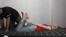 Sarah hogtied with hand and feet cuffs get tickled