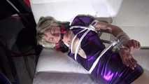 get Video with Sonja bound and geggaed in a shiny purple wetlook Dress