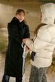 Blond-haired archive girl tied and gagged by another archive girl wearing shiny down jackets (Pics)