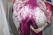 Sexy Sonja wearing a sexy purple downsuit foaming herself with shaving cream (Pics)