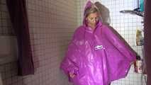 Watching Sandra wearing only a pink shiny nylon raincape under the shower playing with the water (Video)