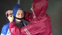 SEXY SANDRA being tied and gagged with ropes and a clothgag from Stella  both wearing sexy shiny nylon AGU rainwear (Video)