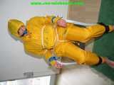 Get 328 Pictures with Katharina tied and gagged in shiny nylon rainwear from 2005-2008!