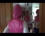 Mara dressing her up with a new supersexy shiny nylon bib oberall and a rain jacket (Video) 