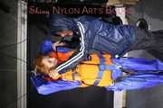 RONJA being tied, gagged and hooded hanging with ropes and a ballgag from Stella both wearing sexy shiny nylon rainwear and Ronja a lifevest (Pics)