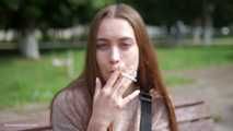 Pretty Ksenia is smoking 120mm cork cigarettes