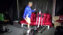 Sexy Sonja during her workout on the crosstrainer wearing a sexy blue/yellow shiny nylon shorts and a rain jacket (Video)