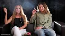 Two friends are smoking sitting on the sofa in this smoking fetish video