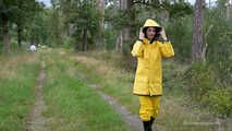 Miss Petra goes for a walk in friesennerz, yellow rain dungarees and rubber boots