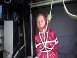 Watch Sandra bound gagged and noosed wearing her shiny nylon Rainwear