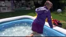 Watching Mara wearing a supersexy purple down skirt and a purple down jacket cleaning the swimming pool and playing with water (Video)