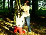 Two girls cuffed to a tree 2/2