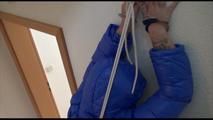 Jill tied, gagged and hooded in a stairway with cuffs wearing a sexy blue PAMY jacket and a rain pants (Video)