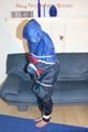 Jill tied, gagged and hooded wearing shiny nylon rainwear (Pics)