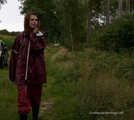 Miss Petra takes a walk in an AGU rain suit and rubber boots