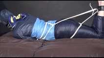 ***HOT PIA*** tied, gagged and hooded with ropes and a cloth gag on bed wearing an oldschool rain jacket and a rain pant (Video)
