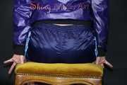 Watching sexy Pia in a sexy oldschool blue shiny nylon shorts and a special rain jacket posing for you on a little chair (Pics)