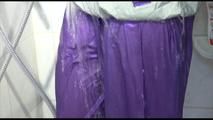 Mara tied, gagged and hooded in a shower wearing a sexy purple rain combination (Video)
