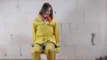 Miss J ziptied and gagged in3 layers of raingear, hard gagged and hooded