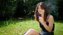 Arina is smoking 120mm cigarettes outdoors