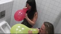 Two girls at the mens toilet
