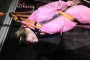 Sexy SANDRA wearing a hot pink oldschool downbib and a down jacket being tied and gagged with ropes and a clothgag hanging on the ceiling  Part 1 of 2 (Pics)