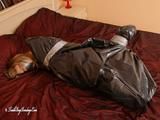 [From archive] Taniella - captured, taped, hogtied and packed into trash bag (2)