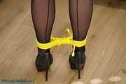 Leatherlady in yellow ropes