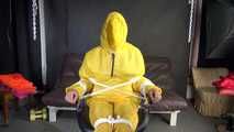 Sandra being tied and gagged on a hairdresser´s chair wearing sexy yellow shiny nylon rainwear being double hooded (Video)