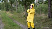 Miss Petra goes for a walk in friesennerz, yellow rain dungarees and rubber boots