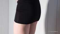 Black mini skirt and heels