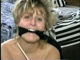 BIG TITS KIM, NUDE, CROTCH ROPED, ACE BANDAGE GAGGED, BALL-TIED, FOOT TICKLED & TOE-TIED WITH RAWHIDE (D39-3)