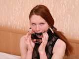 Gatitta - Pale, innocent-looking redhead uses thumb and toe cuffs