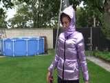 Watch Sandra taking a shower in her new purple shiny nylon down jacket 