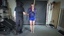 New Model Myxxxy bound in heavy Iron cuffs and gagged with her own Panty