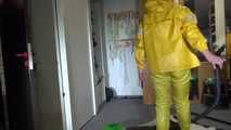 Pia wearing sexy yellow shiny nylon rainwear cleaning up the studio (Video)