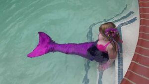 Captured Mermaid Lorelei Bound on the Grill