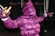 Sandra tied, gagged and hooded complete overhead with ropes and a clothgag wearing a sexy purple down jacket and a rain pant (Pics)