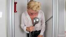 Blonde Frida takes a shower in her white shirt and black glossy pants