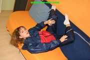 Get 236 pictures of Leoni in shiny nylonrainwear from 2005-2008